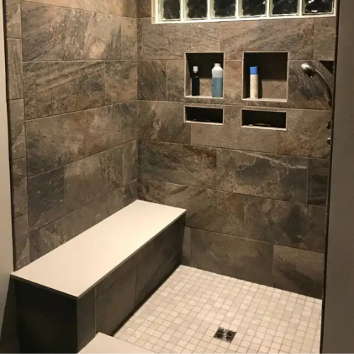 walk-in shower with wall tile